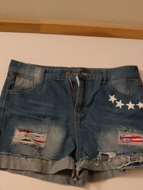 Women's Distressed Denim Shorts with Star Accent - Blue
